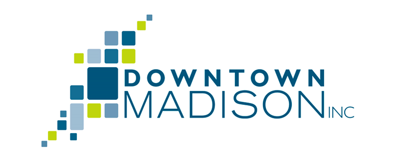 The Downtown Madison Inc logo. Blue and green squares in a grid pattern. 