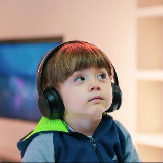 A photo of a child wearing headphones