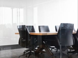 A conference room table and chairs.